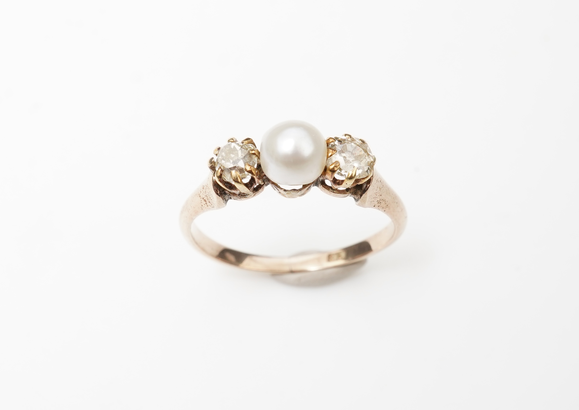 A late Victorian pearl and diamond ring, circa 1900